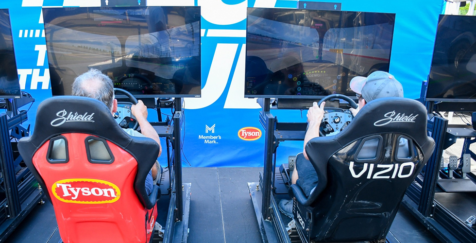 INDYCAR fans enjoy virtual racing at a Sam's Club sponsored event.